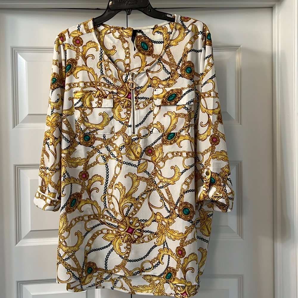 Vibrant Gold and gem tone colored blouse.